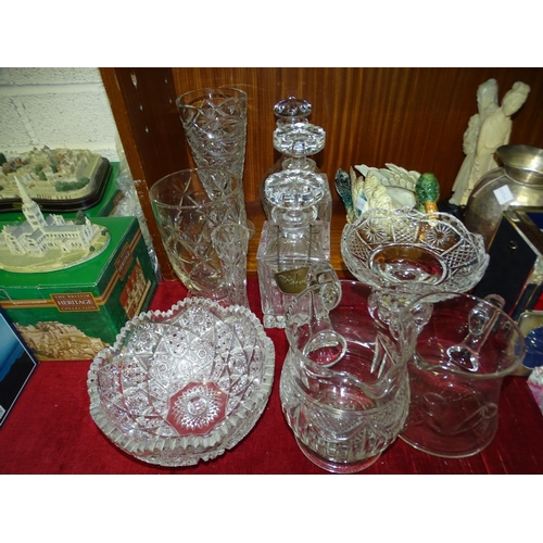 52 - A pair of cut glass decanters and stoppers of square form, 22cm high and other cut glassware.... 