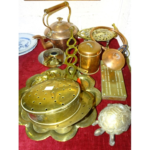 62 - A copper kettle, a brass chestnut roaster, a brass tray and other copper and brass ware and mis... 