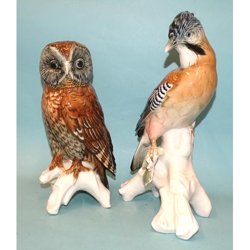 Karl Ens, a porcelain sculpture of a jay impressed 7322 to base, 30.5cm high, (minute chip to edge of leaf), together with another Karl Ens sculpture of a barn owl, impressed 7575 to base, 24cm high, (2).