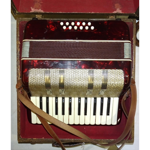 77 - A vintage German-made 'Lyca' accordion, in case.