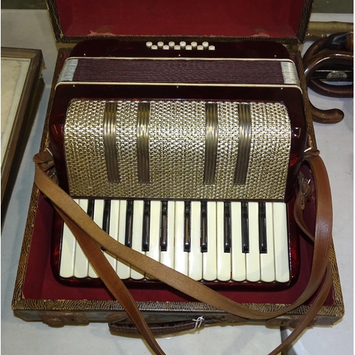 77 - A vintage German-made 'Lyca' accordion, in case.