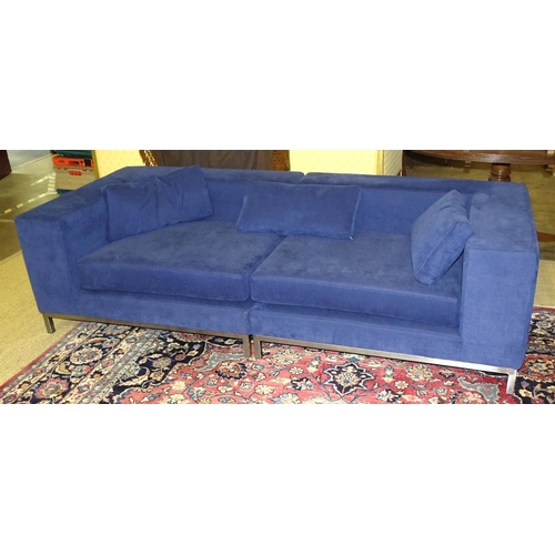 12 - A modern blue upholstered two-section deep-seated settee on polished metal frame, 230cm long.... 