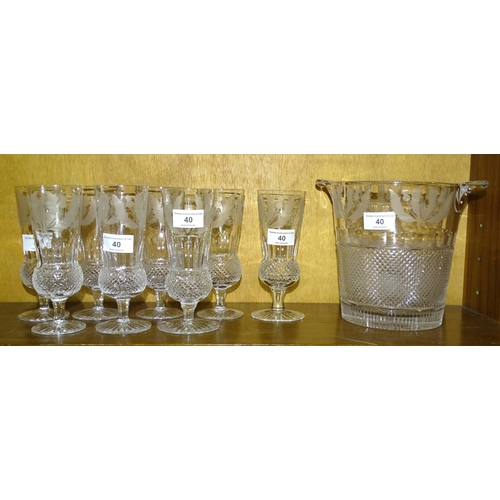 40 - Edinburgh Crystal, a set of five etched thistle and hobnail-decorated tall champagne flutes, (plus a... 