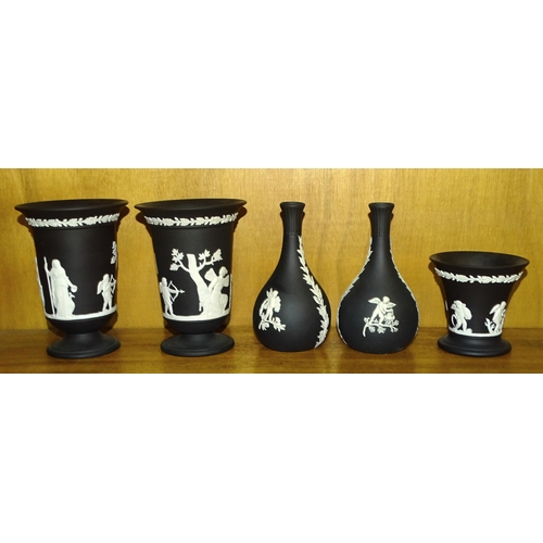 80 - A pair of Wedgwood black and white jasperware vases decorated with classical scenes, 13.5cm high, a ... 