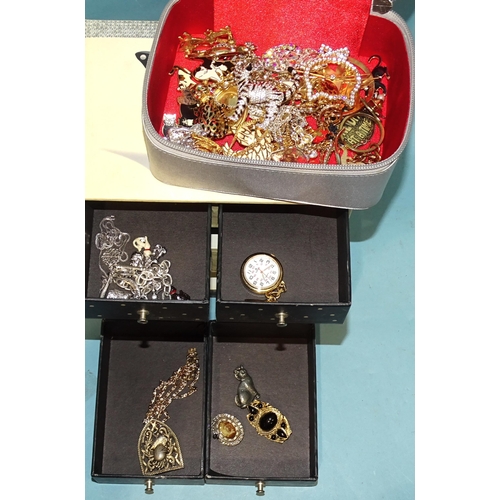 111 - A quantity of costume jewellery, including some silver jewellery and diamanté cat brooches, etc.... 