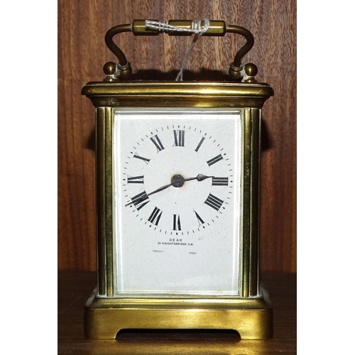 86 - A French brass-cased carriage clock, the dial with Roman numerals, marked Dear, 35 Knightsbridge, SW... 