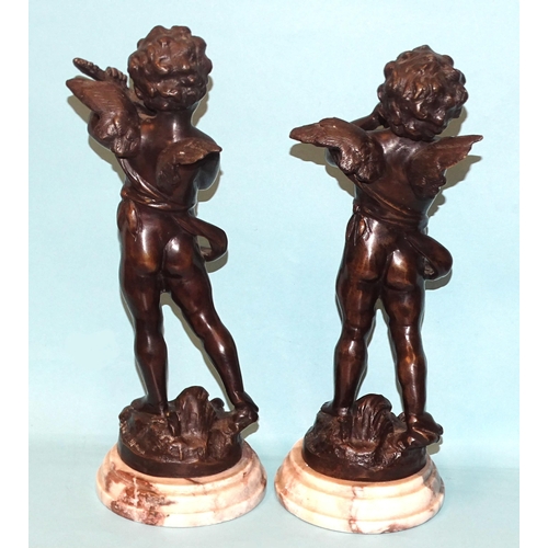 27 - After L F Moreau, a pair of bronzed metal figures of cherub musicians playing a violin and a saxopho... 