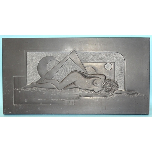 25 - Jim Martins, Salcombe, a hand-carved Italian slate sculpture depicting a nude female figure laying o... 