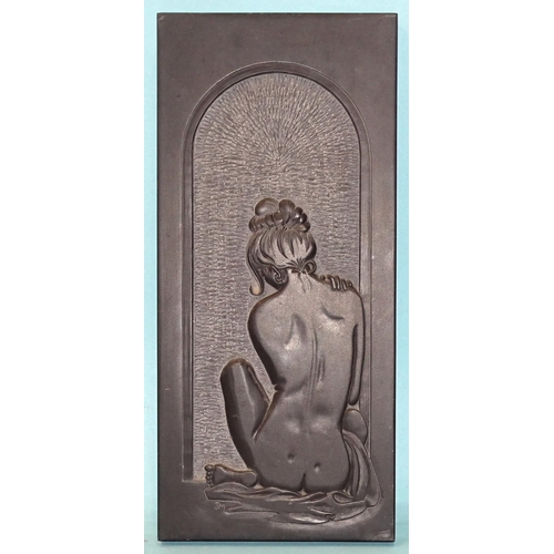 26 - Jim Martins, Salcombe, a hand-carved slate sculpture depicting a nude female figure in an archway, s... 