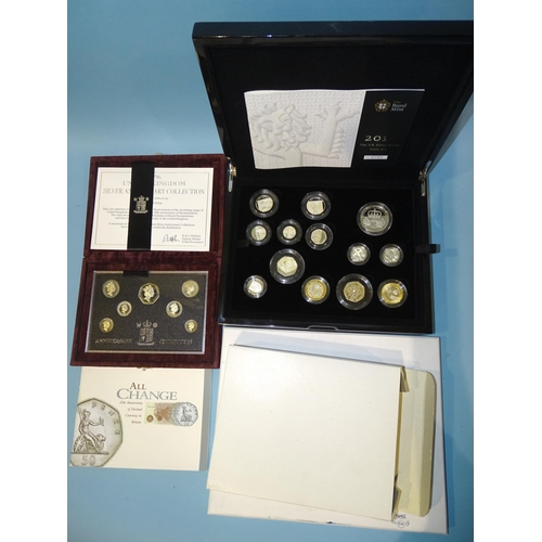 133 - The Royal Mint, 'The 2010 United Kingdom Silver Proof Thirteen Coin Set', with booklet no.0785 and a... 