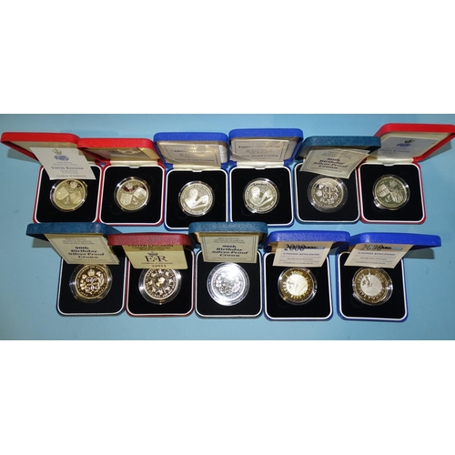 139 - The Royal Mint, a collection of eleven cased silver proof commemorative crowns/£5 coins, compr... 