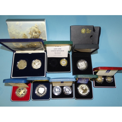 146 - The Royal Mint, a collection of eight cased silver proof coins, comprising: 2005 Nelson-Trafalgar tw... 