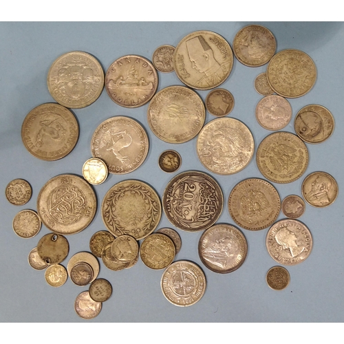 190 - A collection of various World silver and white metal coinage, total weight 437g.