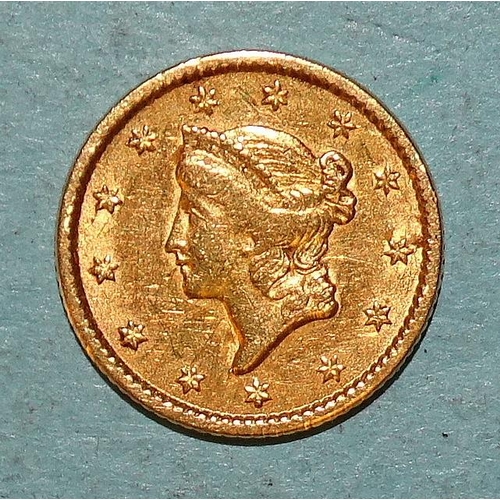 214 - A USA 1851 'Liberty Head' gold one-dollar coin, (1st type), 1.7g.