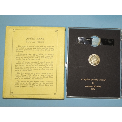 222 - A Queen Anne replica 9ct gold touch piece by Johnson Matthey 1974, within original plastic case and ... 