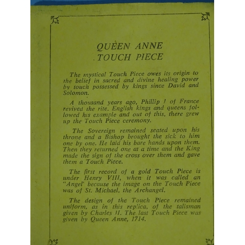 222 - A Queen Anne replica 9ct gold touch piece by Johnson Matthey 1974, within original plastic case and ... 