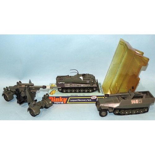 338 - Dinky Toys, 699 Leopard Recovery Tank, in bubble pack, 694 Tank Destroyer and 656 88mm Gun, (both un... 