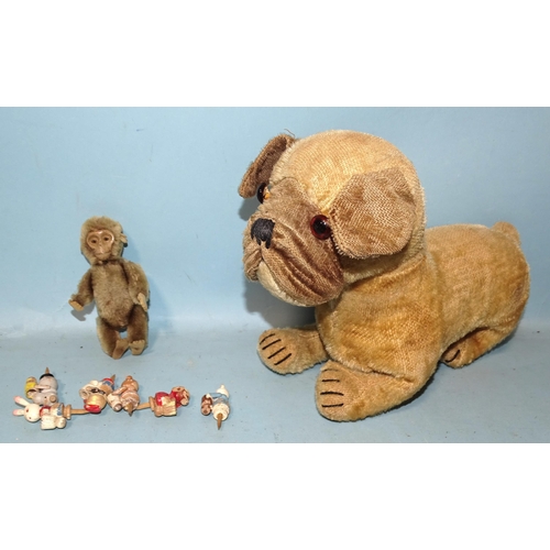 448 - A Schuco plush-covered tinplate monkey, appears to be clockwork, (not working), with felt hands and ... 