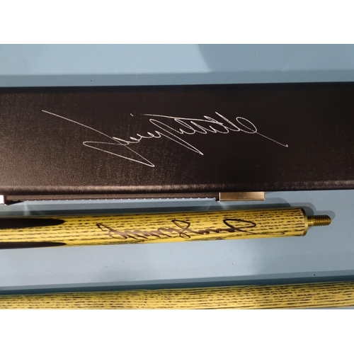 496 - A Buffalo two-piece snooker cue signed by Jimmy White, in case.