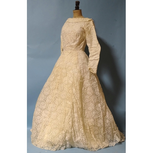 513 - Ellis, London, a professionally-made wedding dress c1960's, of ivory taffeta overlaid with machine-m... 