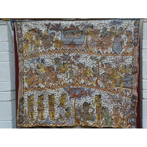 517 - An Indonesian batik wall hanging depicting numerous figures, 122 x 135cm.