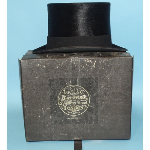 519 - A vintage beaver skin top hat by Frazer & Sons, Merchant Tailors & Outfitters, Perth, Pitloc... 