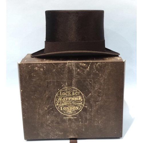 519 - A vintage beaver skin top hat by Frazer & Sons, Merchant Tailors & Outfitters, Perth, Pitloc... 