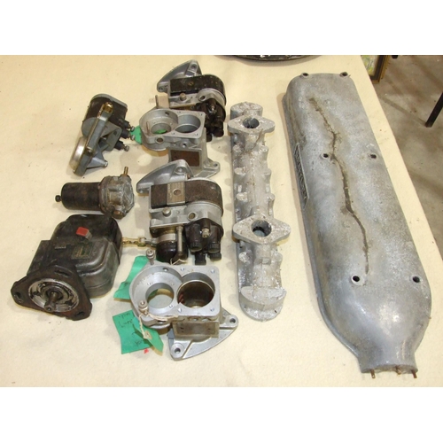 539 - A collection of restored and unrestored car parts, probably for vintage Bentley cars, including thre... 