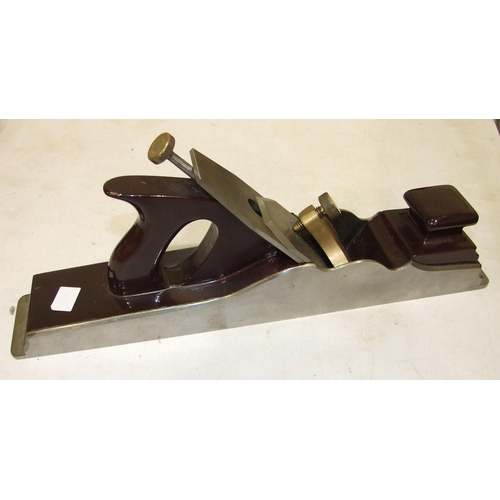 549 - A Norris large smoothing plane in restored condition, with lacquered wooden parts, 43cm long.... 