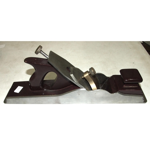 549 - A Norris large smoothing plane in restored condition, with lacquered wooden parts, 43cm long.... 