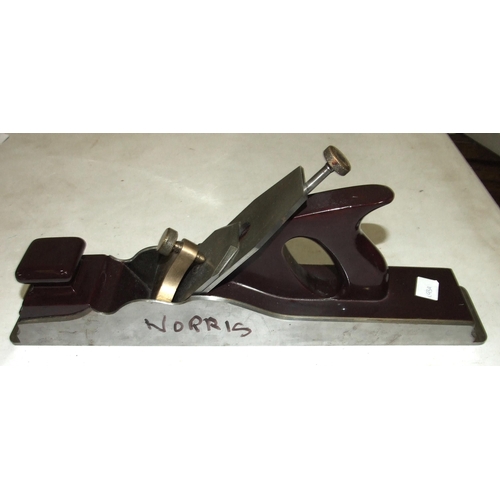 549 - A Norris large smoothing plane in restored condition, with lacquered wooden parts, 43cm long.... 