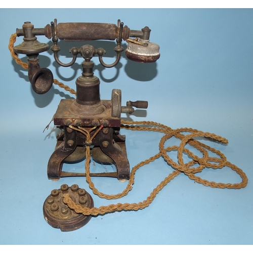 552 - An early-20th century skeleton-type hand-cranked telephone, probably made by Ericasson, marked no.16... 