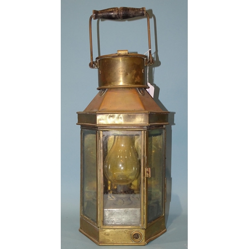 553 - Bulpitt & Sons, Birmingham, a brass bulkhead lamp dated 1914, 40cm high, (50cm high with handle ... 