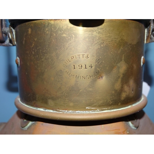 553 - Bulpitt & Sons, Birmingham, a brass bulkhead lamp dated 1914, 40cm high, (50cm high with handle ... 