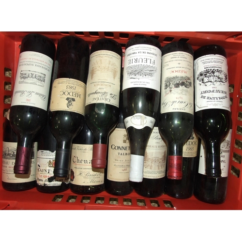 585 - A collection of thirteen bottles of red wine, mainly French, 1980's and 1990's.