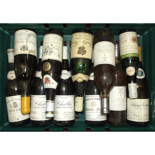 586 - A collection of sixteen bottles of mainly 80's-90's white wines, including Meursault 1984, four bott... 