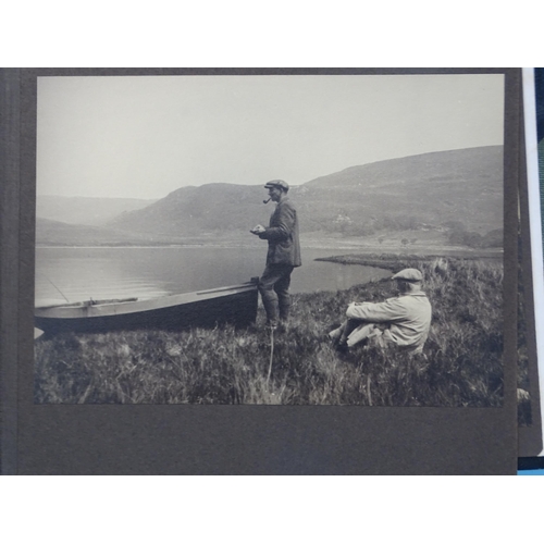 85 - Two albums of photographs, early-20th century, including 21.5 x 27cm prints of salmon fishing in Sco... 