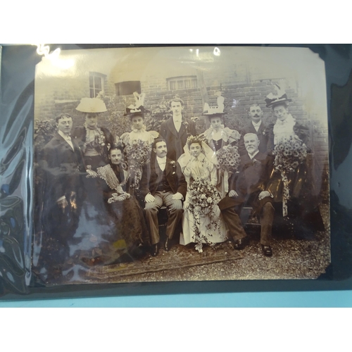 88 - Two large albums of black and white photographs of weddings, late-19th century to 1980's.... 