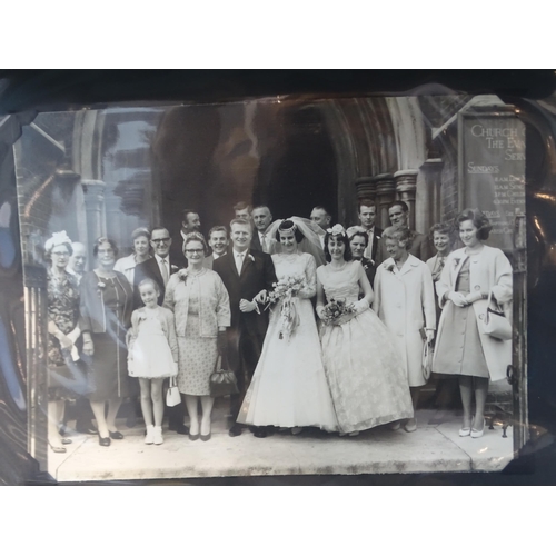 88 - Two large albums of black and white photographs of weddings, late-19th century to 1980's.... 