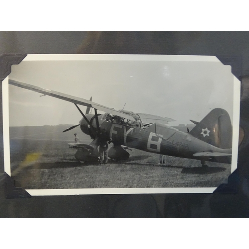 94 - An album of approximately 75 black and white photographs of aircraft, mainly during WWII and before,... 