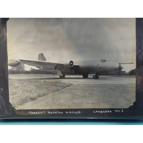 94 - An album of approximately 75 black and white photographs of aircraft, mainly during WWII and before,... 