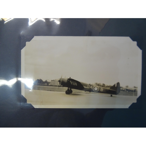 94 - An album of approximately 75 black and white photographs of aircraft, mainly during WWII and before,... 