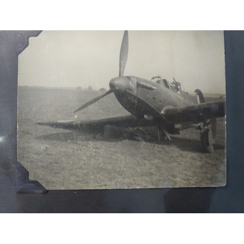 94 - An album of approximately 75 black and white photographs of aircraft, mainly during WWII and before,... 