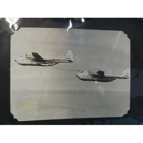 95 - An album of approximately 75 black and white photographs of aeronautical subjects, including refuell... 