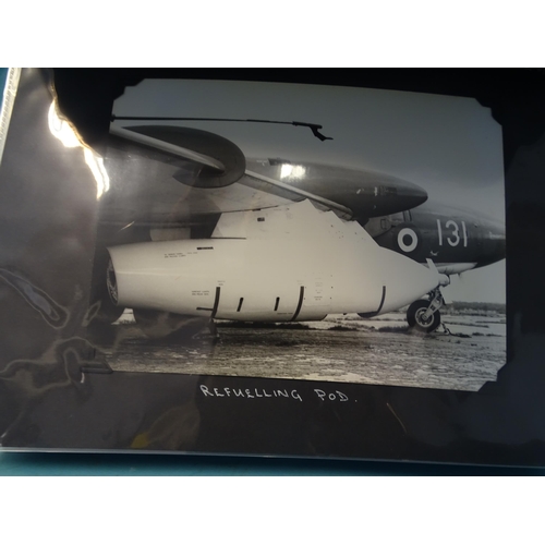 95 - An album of approximately 75 black and white photographs of aeronautical subjects, including refuell... 