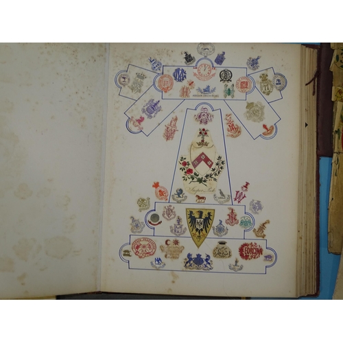 72 - A Victorian album of crests, monograms and scraps, with other ephemera.