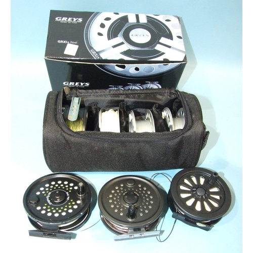 474 - A Grays fly reel with three spare spools, in case and box, with three other fly reels, (4).... 