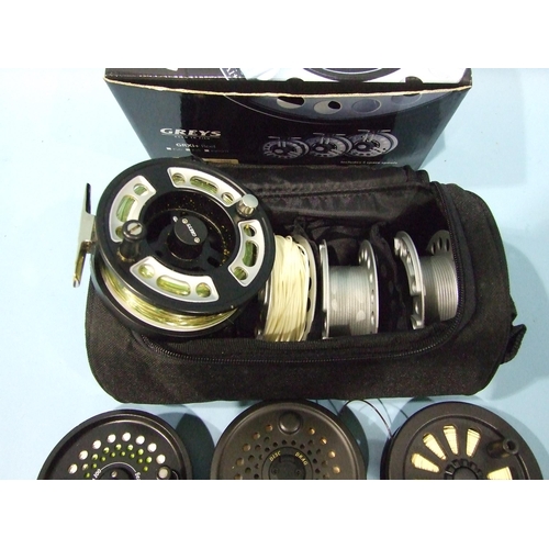 474 - A Grays fly reel with three spare spools, in case and box, with three other fly reels, (4).... 