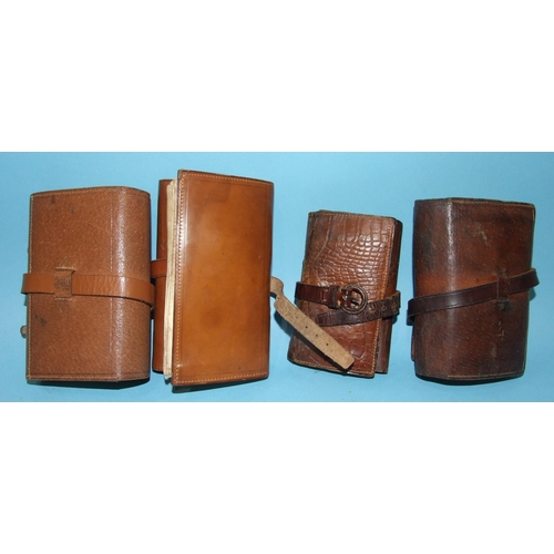 475 - Four leather fly wallets containing approximately twenty-four trout and salmon flies.... 