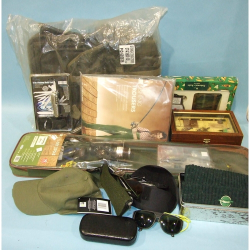 478 - A fishing rucksack and tackle carrier, (as new), an ICFF fishing kit (as new in bag) and other moder... 